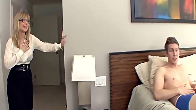 Big boobed blonde milf in stockings and a garter